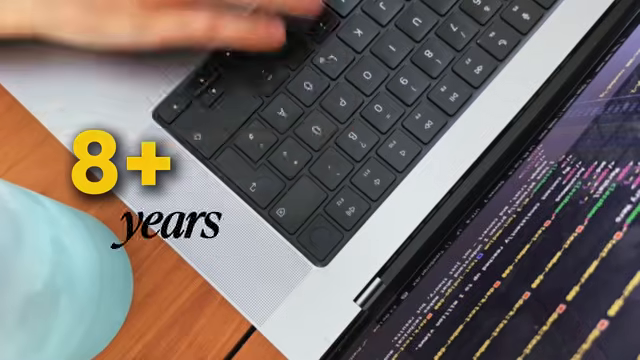 typing close-up with the eight-plus-years credential overlay
